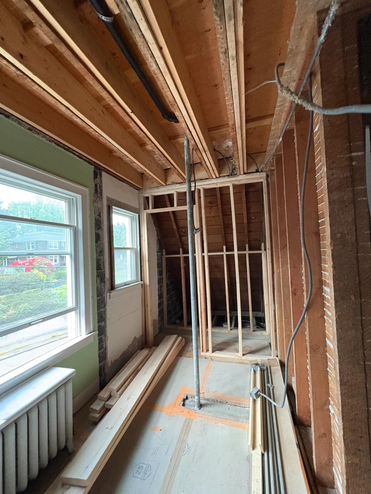 Exterior walls stripped to the brick and sheathing