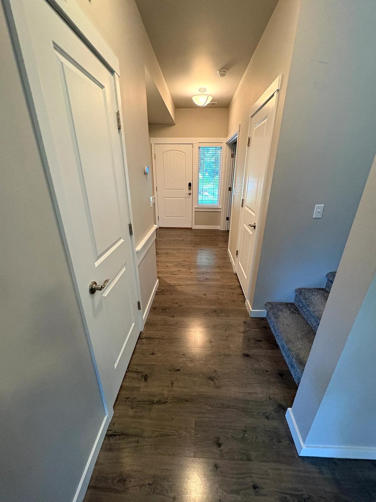 Dark laminate in the entry before replacement