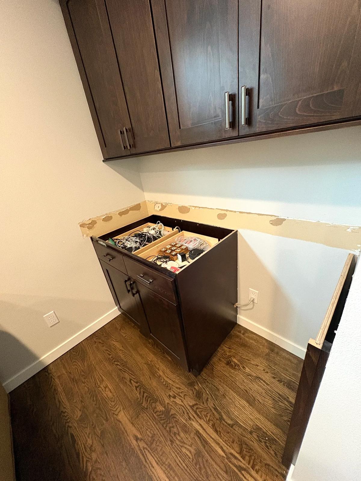 Light granite countertop before and after removal., after